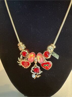 Gold-Tone Necklace with Red and Pink Enamel Charms